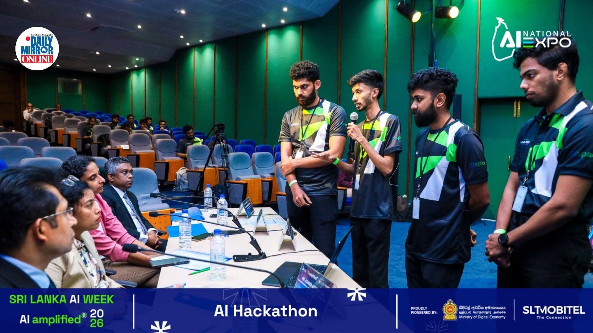 The SinAI team presenting to the judging panel at the AI Hackathon, National AI Expo 2026