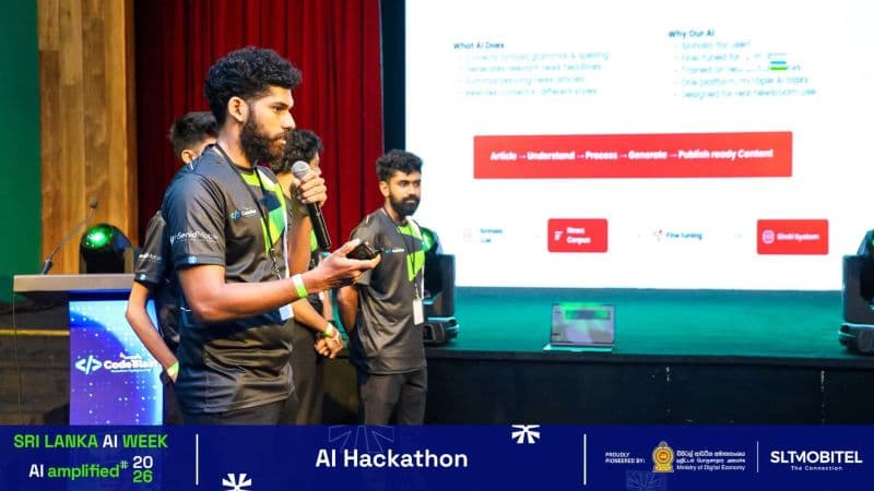A SinAI team member presenting on stage at the National AI Expo